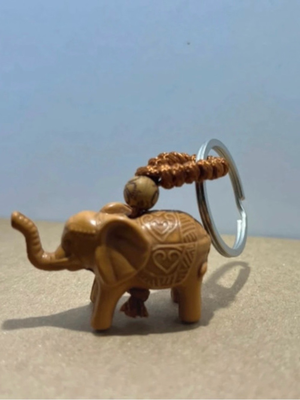 Hand-Carved Brown Elephant Keyring with Decorative Bead
